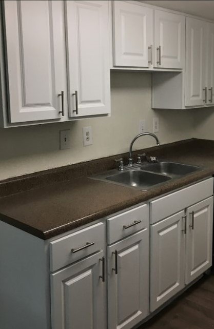 5x7 Kit Resurfaced With White Cabinets Sink Shot 1-1
